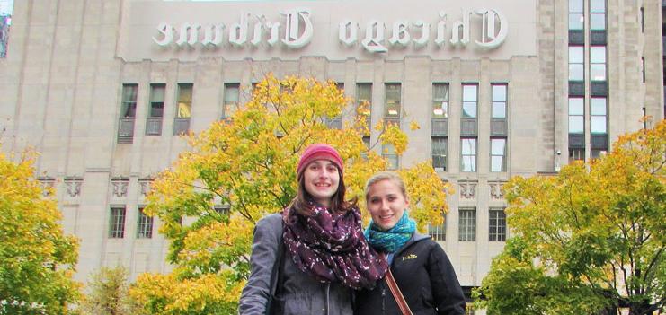 Manchester English majors Kari and Emily pose in front of the Chicago Tribune